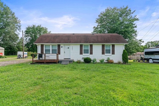 view of front of property with a front lawn