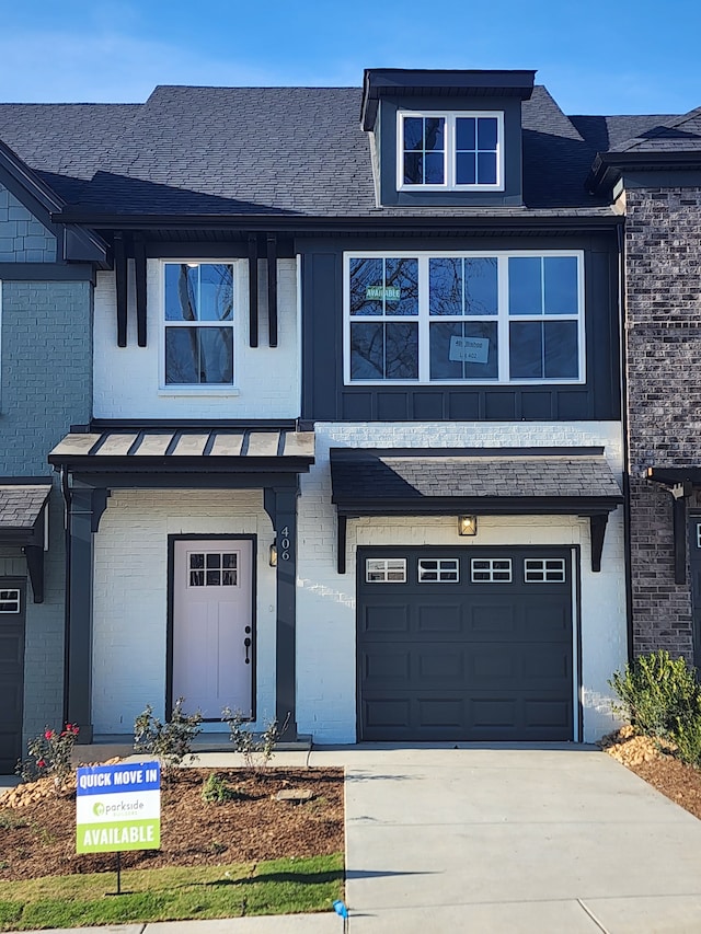 view of front of property featuring a garage