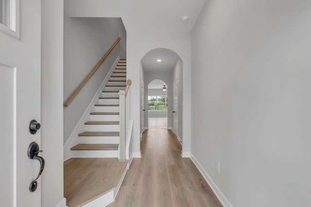 foyer entrance with light hardwood / wood-style flooring