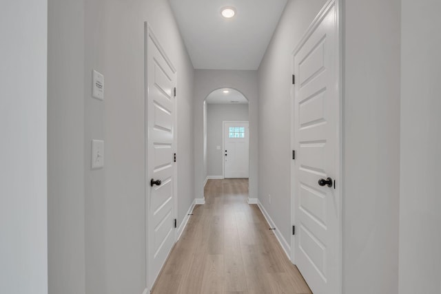 corridor featuring light hardwood / wood-style flooring