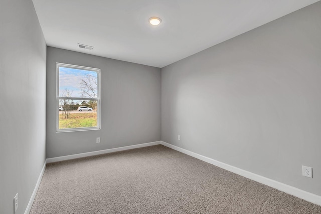 view of carpeted spare room