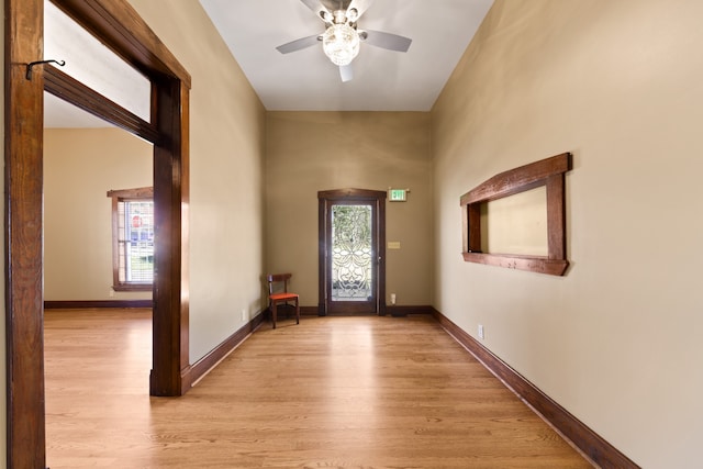 foyer featuring ceiling fan and light hardwood / wood-style floors