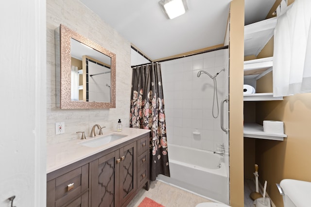 full bathroom with shower / bath combination with curtain, vanity, and toilet