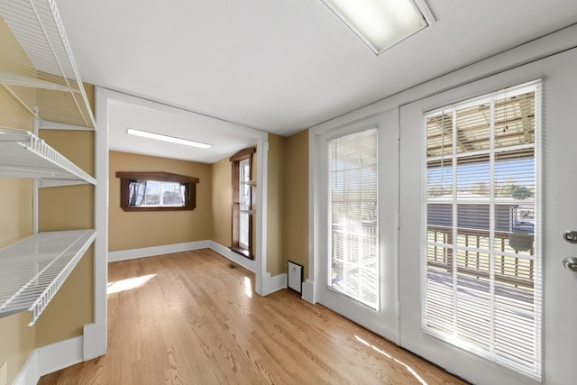 doorway to outside featuring light hardwood / wood-style floors