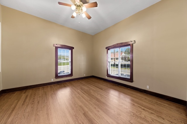 empty room featuring ceiling fan and light wood-type flooring