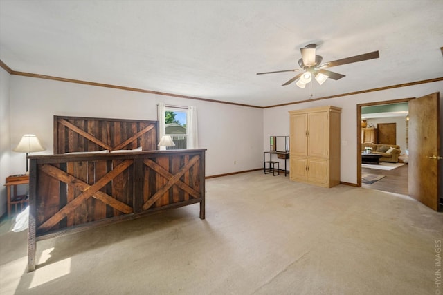 interior space with ceiling fan, light colored carpet, and crown molding