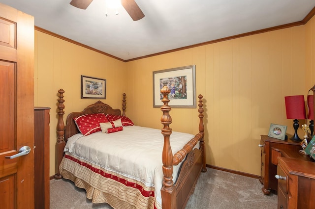 bedroom featuring ceiling fan, carpet floors, and ornamental molding