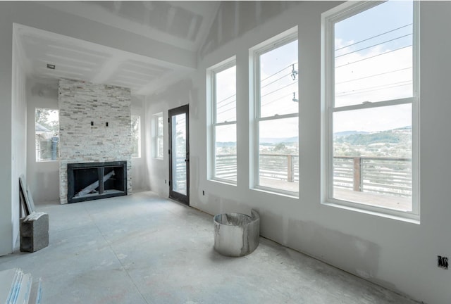 living room featuring a fireplace