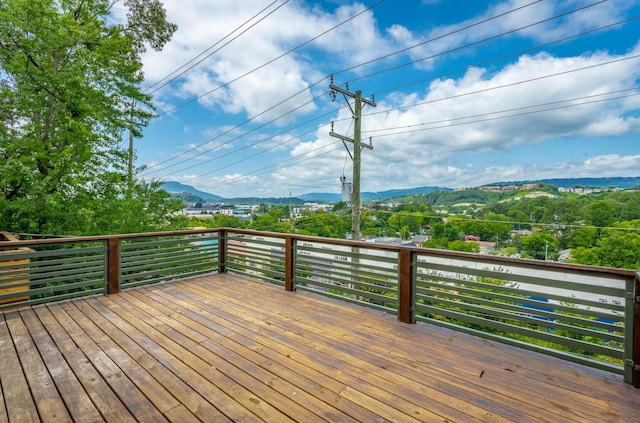 wooden terrace with a mountain view