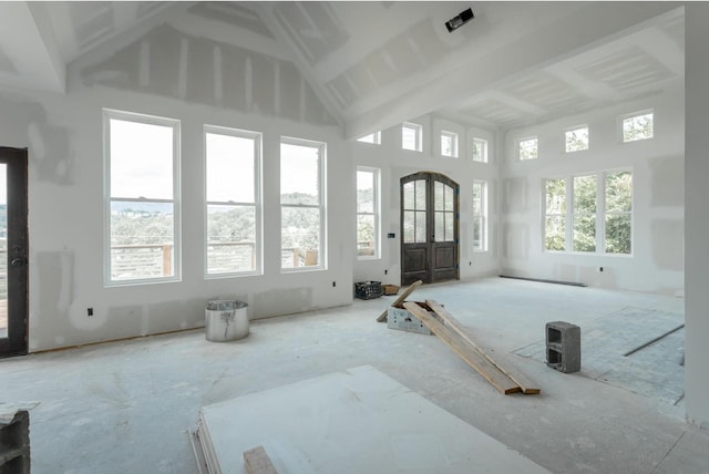 interior space featuring high vaulted ceiling