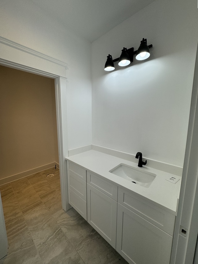 bathroom with vanity and tile patterned floors