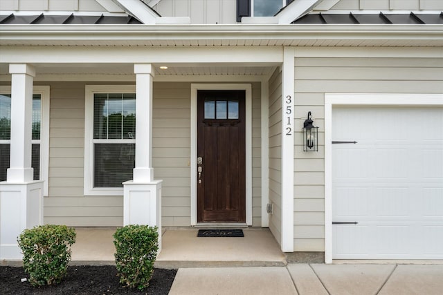 property entrance with a garage