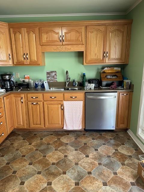 kitchen featuring sink, dishwasher, and ornamental molding