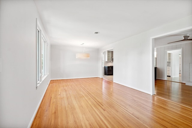 unfurnished living room featuring hardwood / wood-style flooring