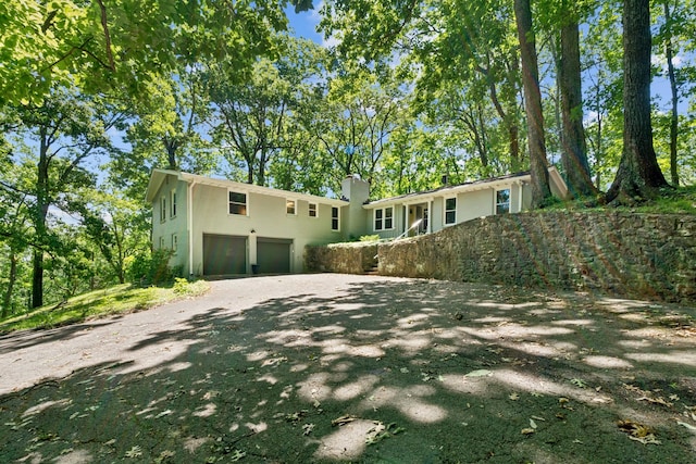 view of front of property featuring a garage