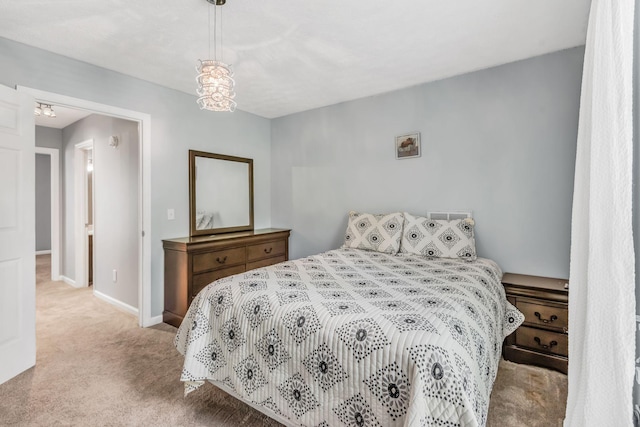 bedroom with light colored carpet