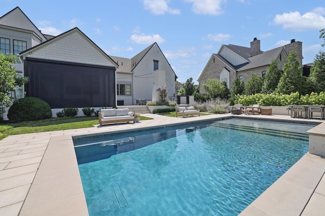 view of swimming pool with an outdoor hangout area and a patio area