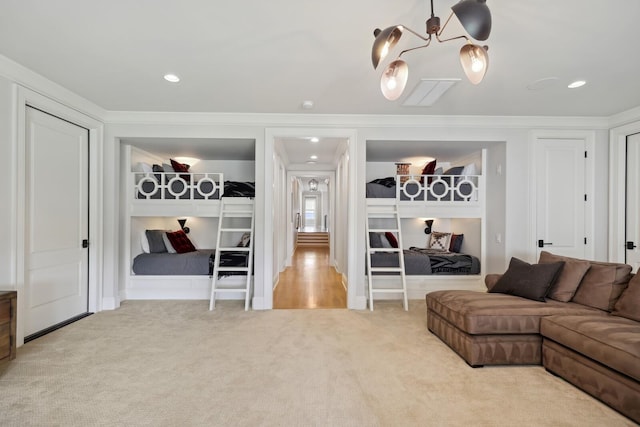 carpeted living room with crown molding