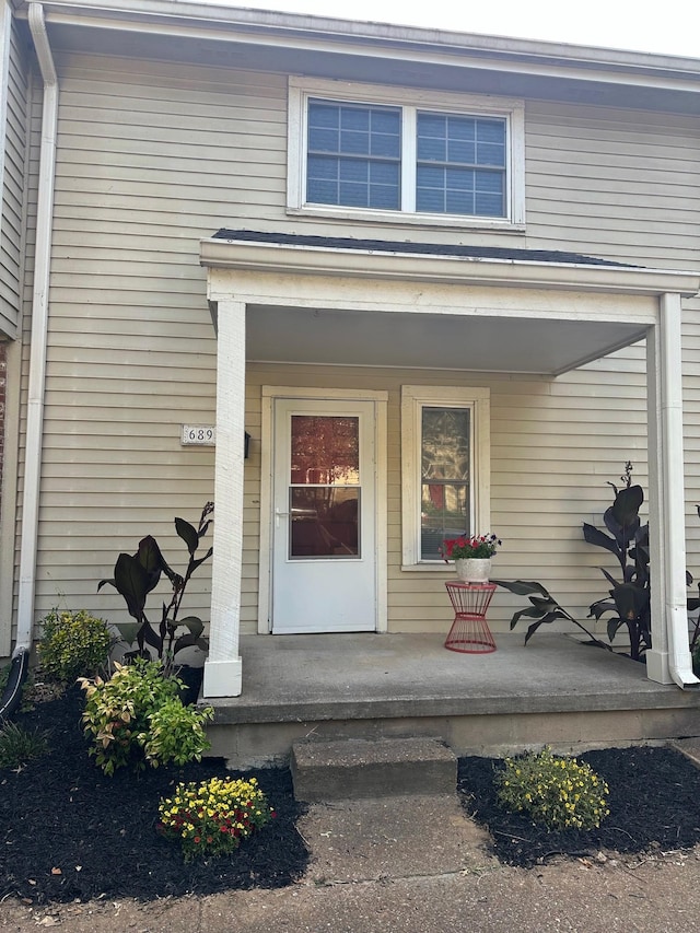 entrance to property with a porch