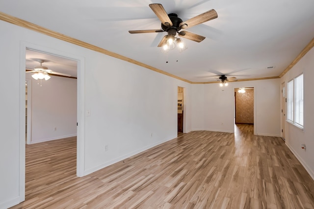 spare room featuring light wood-type flooring, ceiling fan, and crown molding