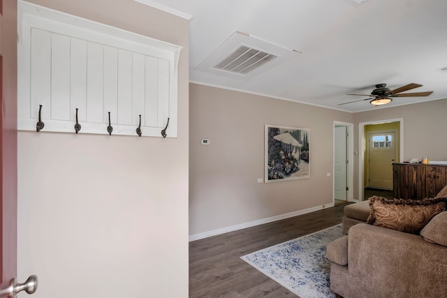 living room featuring crown molding, ceiling fan, and hardwood / wood-style floors