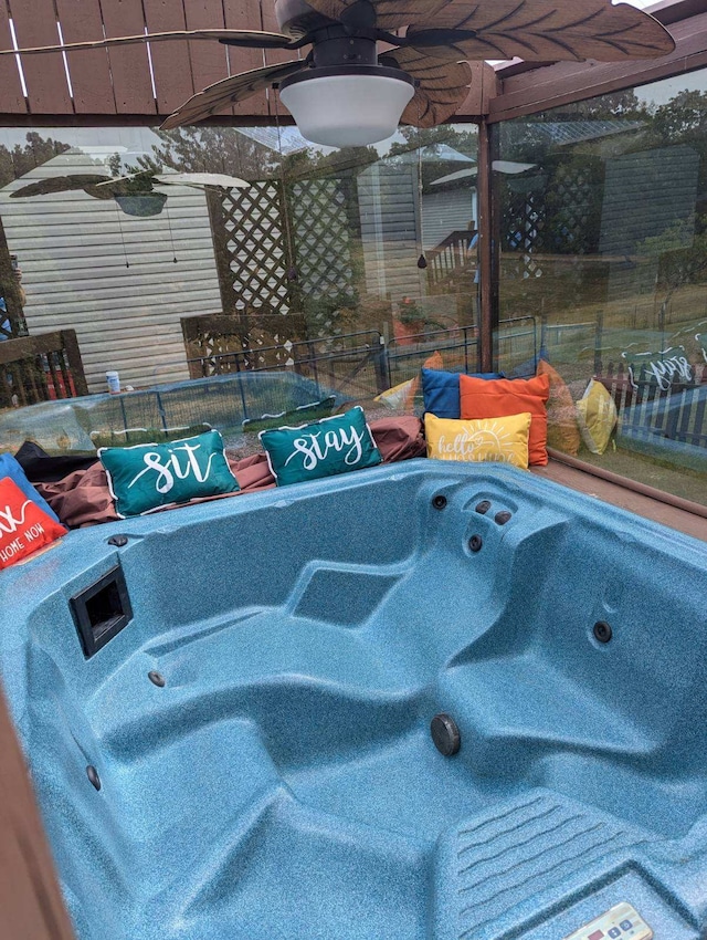 view of pool featuring a hot tub