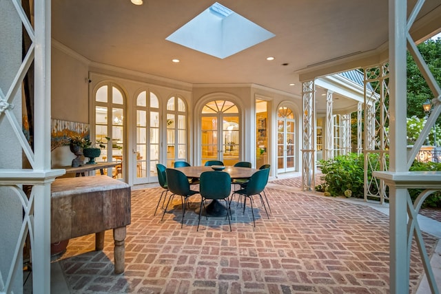 sunroom with a skylight