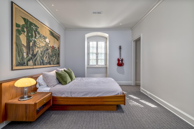 carpeted bedroom with crown molding