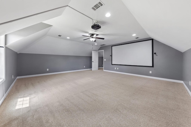 701 Vanview Dr, Lebanon, TN 37087 - home theater featuring lofted ceiling, baseboards, visible vents, and light carpet