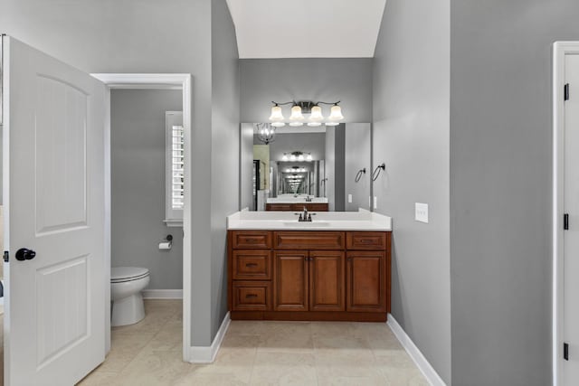 701 Vanview Dr, Lebanon, TN 37087 - bathroom featuring baseboards, toilet, vanity, and tile patterned flooring