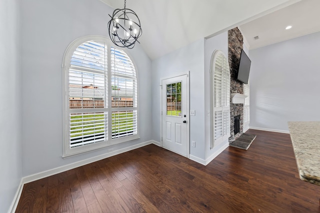 701 Vanview Dr, Lebanon, TN 37087 - entryway featuring dark wood-type flooring, baseboards, a chandelier, and a large fireplace