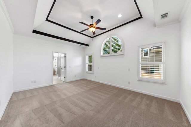 701 Vanview Dr, Lebanon, TN 37087 - spare room with baseboards, visible vents, ornamental molding, a raised ceiling, and carpet flooring