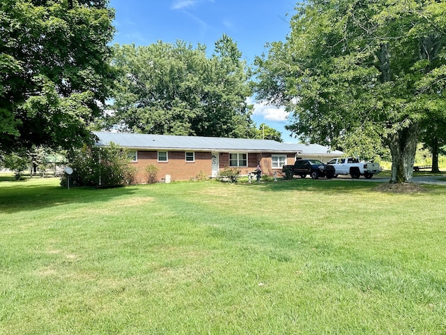 view of front of house with a front yard