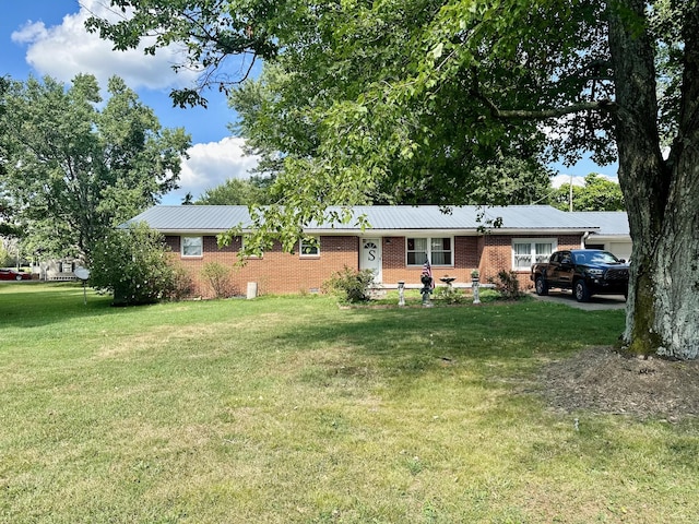 view of front of home with a front yard