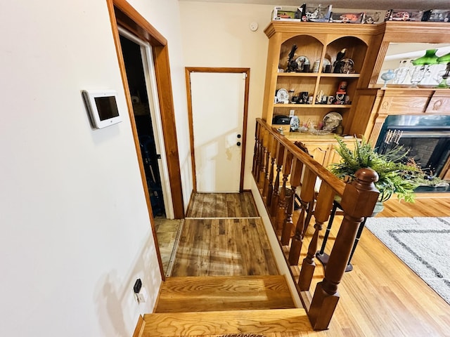 corridor featuring hardwood / wood-style flooring