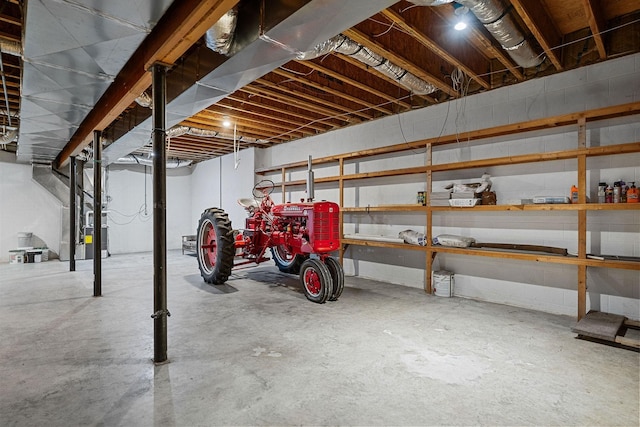 unfinished basement with heating unit