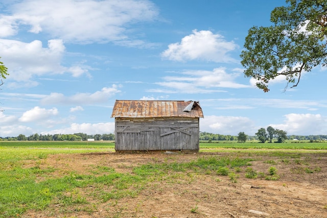 view of outdoor structure featuring a rural view