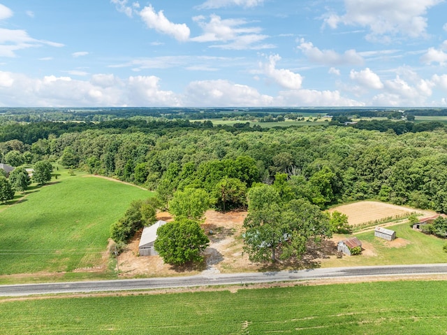 birds eye view of property with a rural view