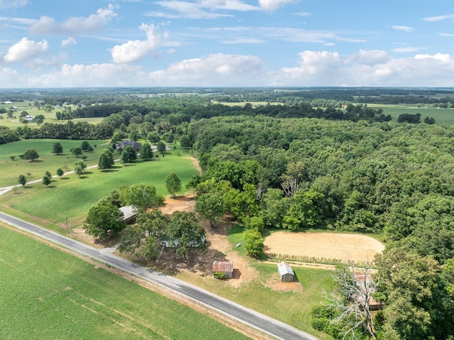 birds eye view of property with a rural view