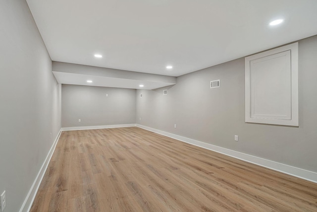 basement with light wood-type flooring