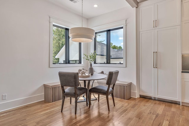 dining room with light wood-type flooring