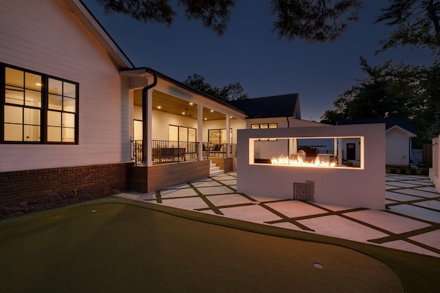 view of patio at night