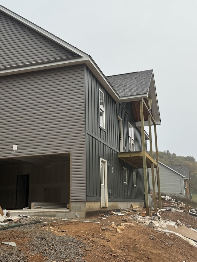 view of property exterior featuring a garage