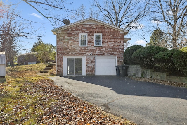 view of home's exterior with a garage