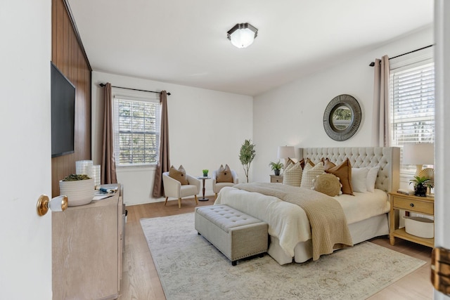 bedroom with light hardwood / wood-style flooring