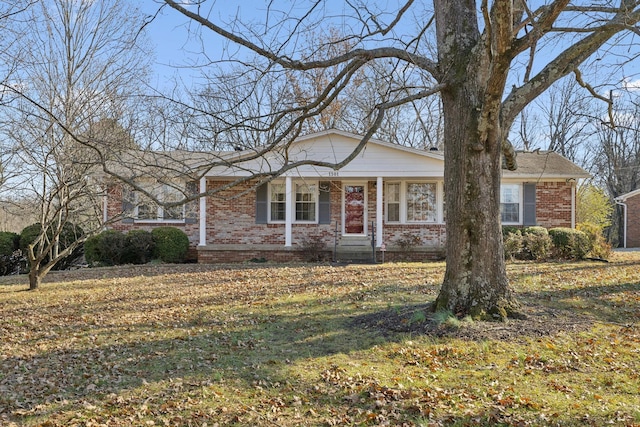 single story home with a front yard