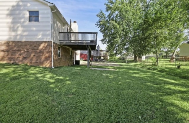 view of yard featuring a deck