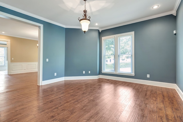 unfurnished room with ornamental molding, plenty of natural light, and dark wood-type flooring