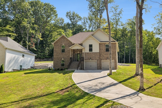 bi-level home featuring a garage and a front yard