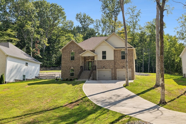 raised ranch featuring a garage and a front lawn